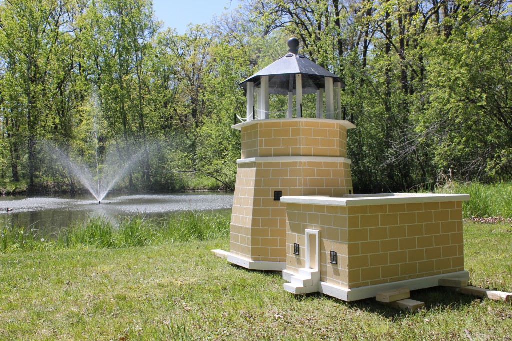 This replica of the Split Rock Lighthouse has a perfect setting next to the pond.