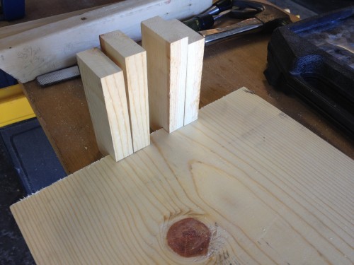 I stacked two pieces of 1"x3" on each side for the upright support.  I later added a middle bar with two more pieces.