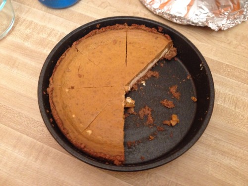 Layered cheesecake pumpkin pie on a graham cracker crust