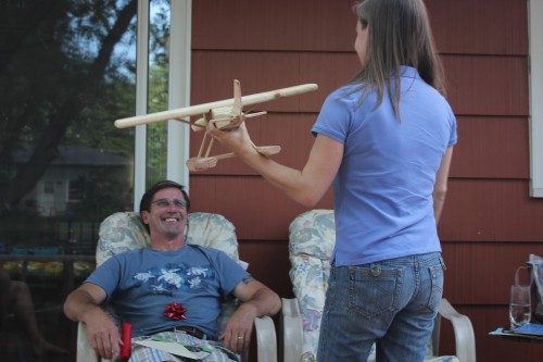 My father-in-law receiving his airplane whirligig as a Fathers Day gift.