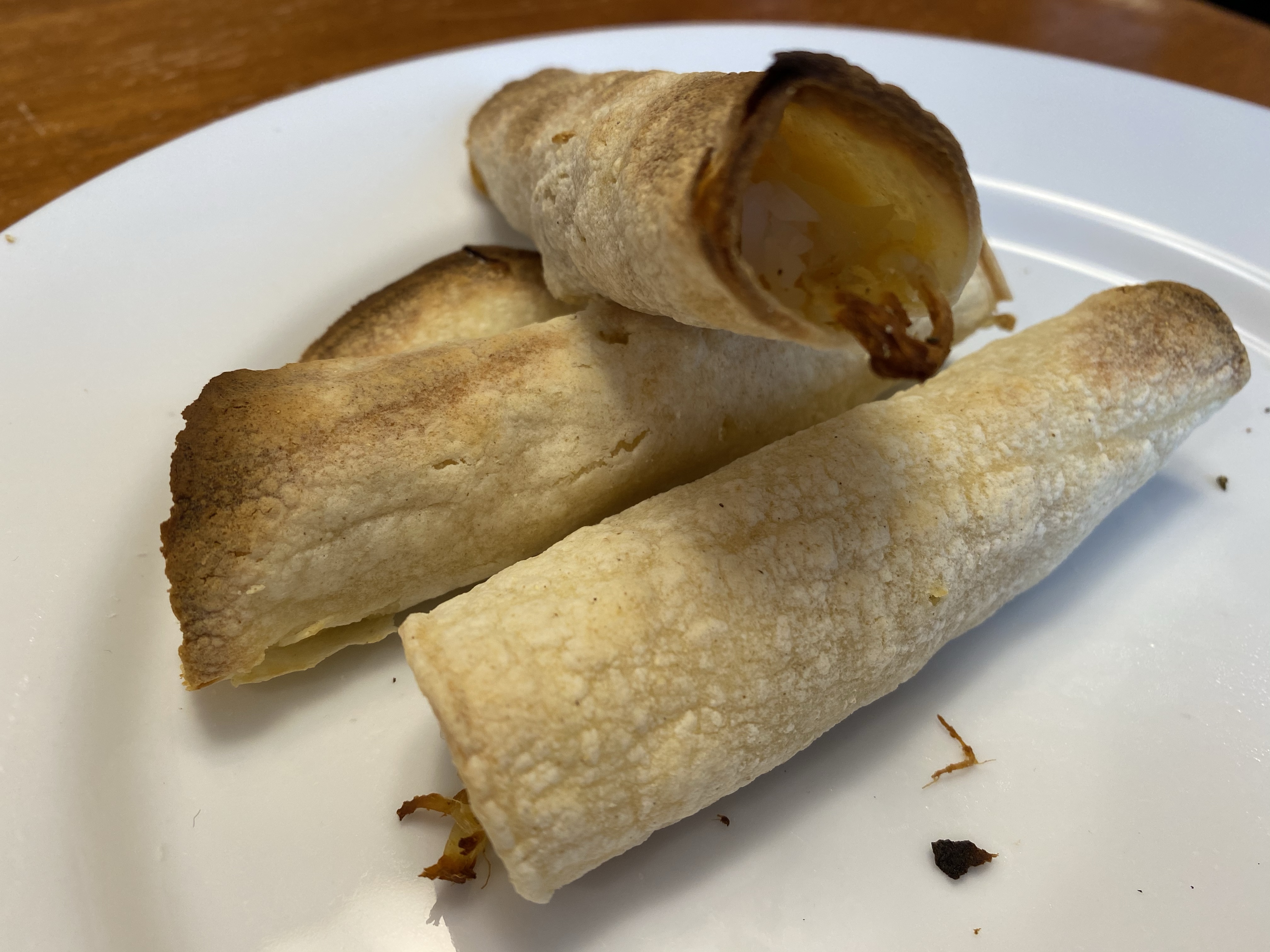 plate of chicken taquitos from the air fryer