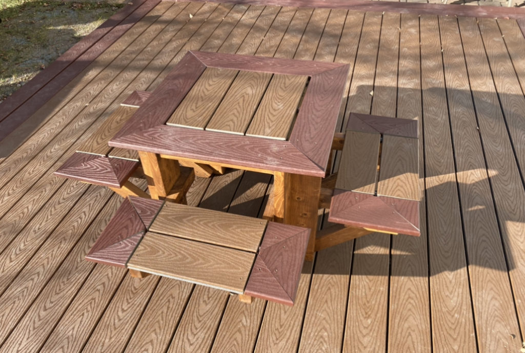 Kids picnic table with trex decking top on matching deck
