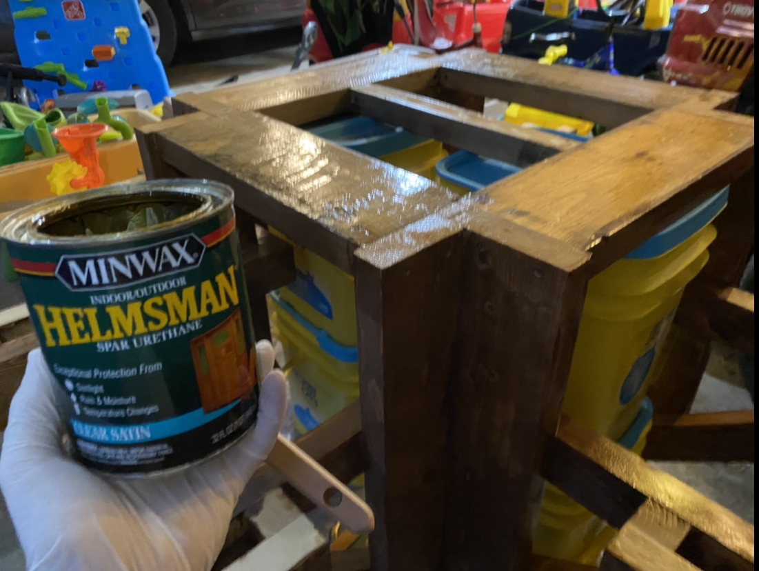 Apply stain and clear coat to the sub structure of the kids square picnic table